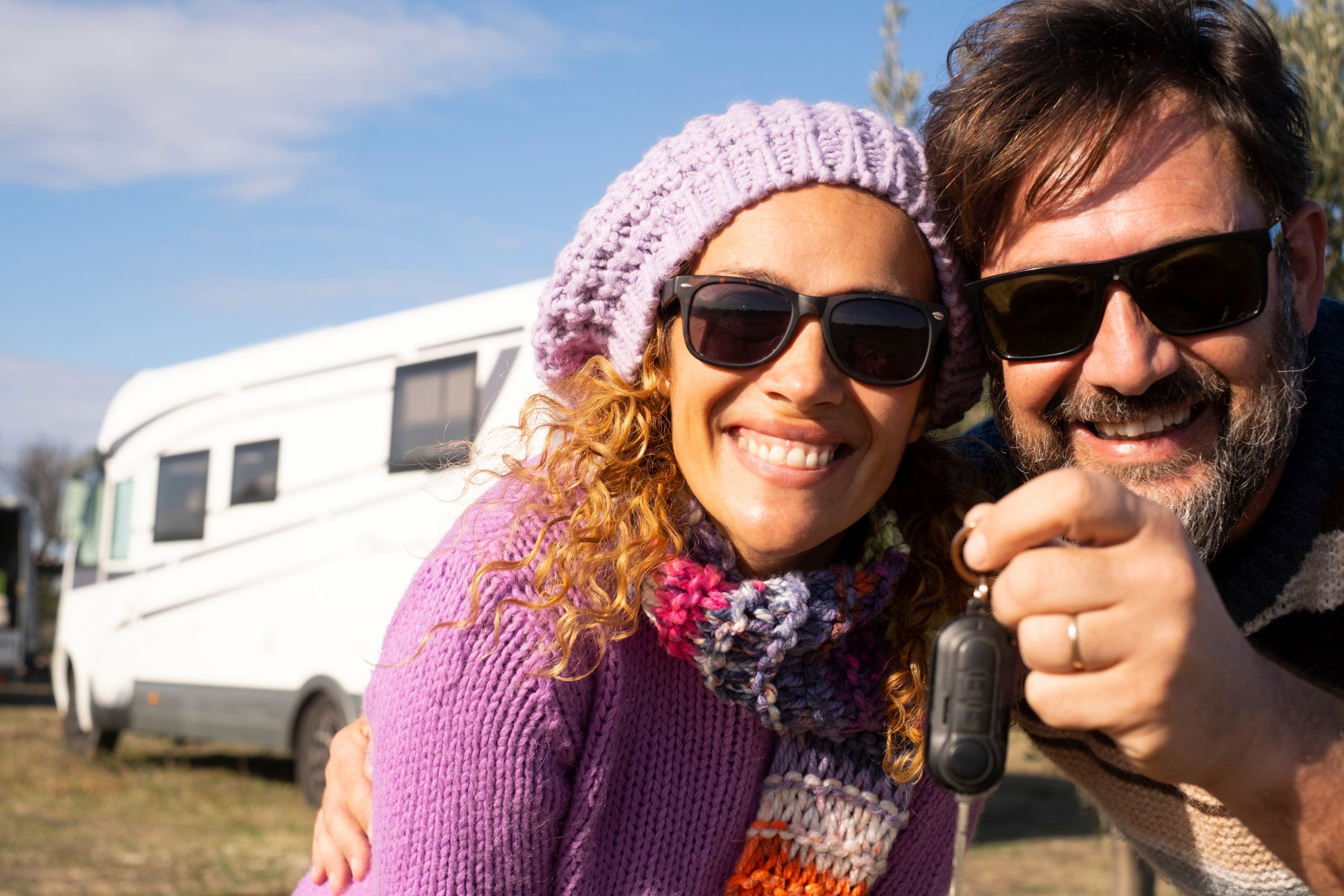 couple with new rv